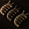 Five-tooth massage comb